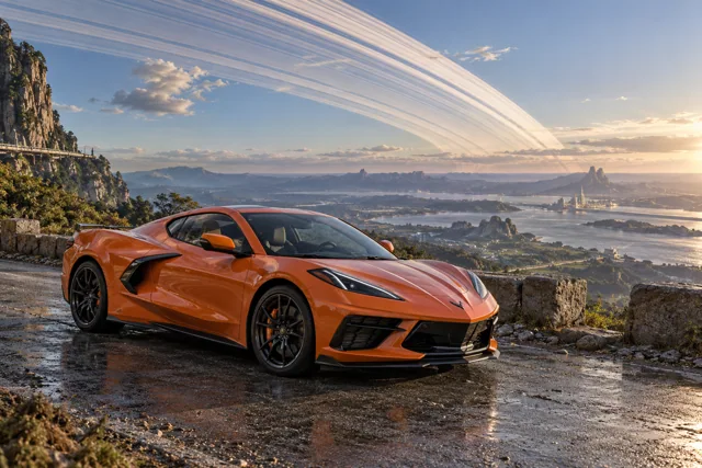AI-generated orange mid-engine sports coupe in Ringworld. Great rings arc across the sky above a broad horizon.