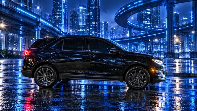 Donna Dew’s black 2025 Chevrolet Equinox. Donna’s Black Equinox in Blue Rain. Fictional automotive artwork.