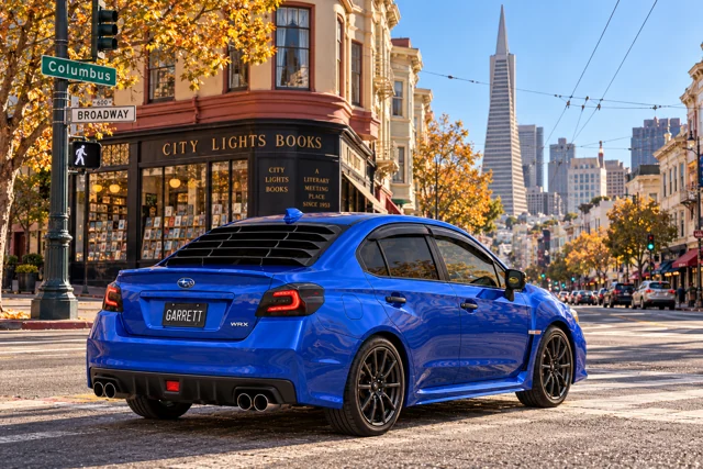 Garrett’s blue 2016 Subaru WRX. An imagined photoshoot at Columbus Avenue and Broadway in San Francisco, USA, with City Lights Books and the Transamerica Pyramid.